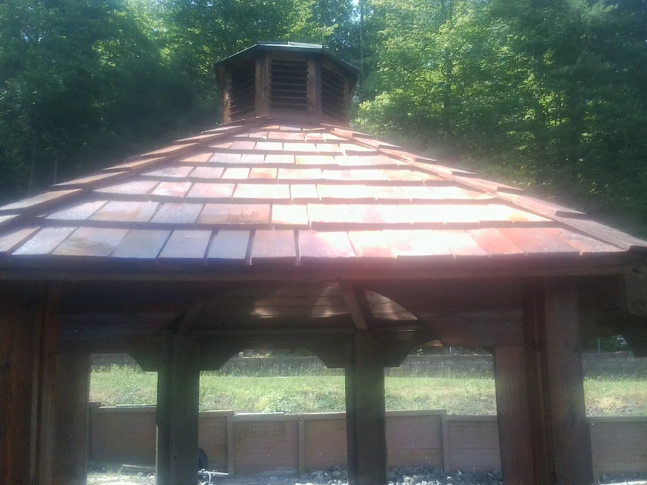 New cedar shake roof and cupola on a lakeside gazebo in Emmitsburg